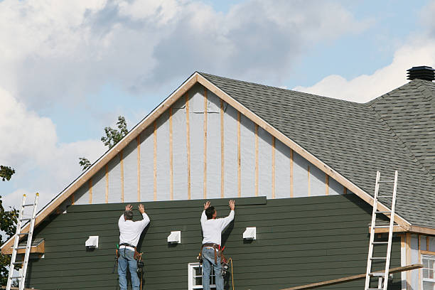 Professional Vinyl Siding technician working in Hayes, VA